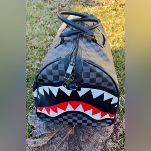 Sprayground Black and Red Checkered Duffel Bag/Used
